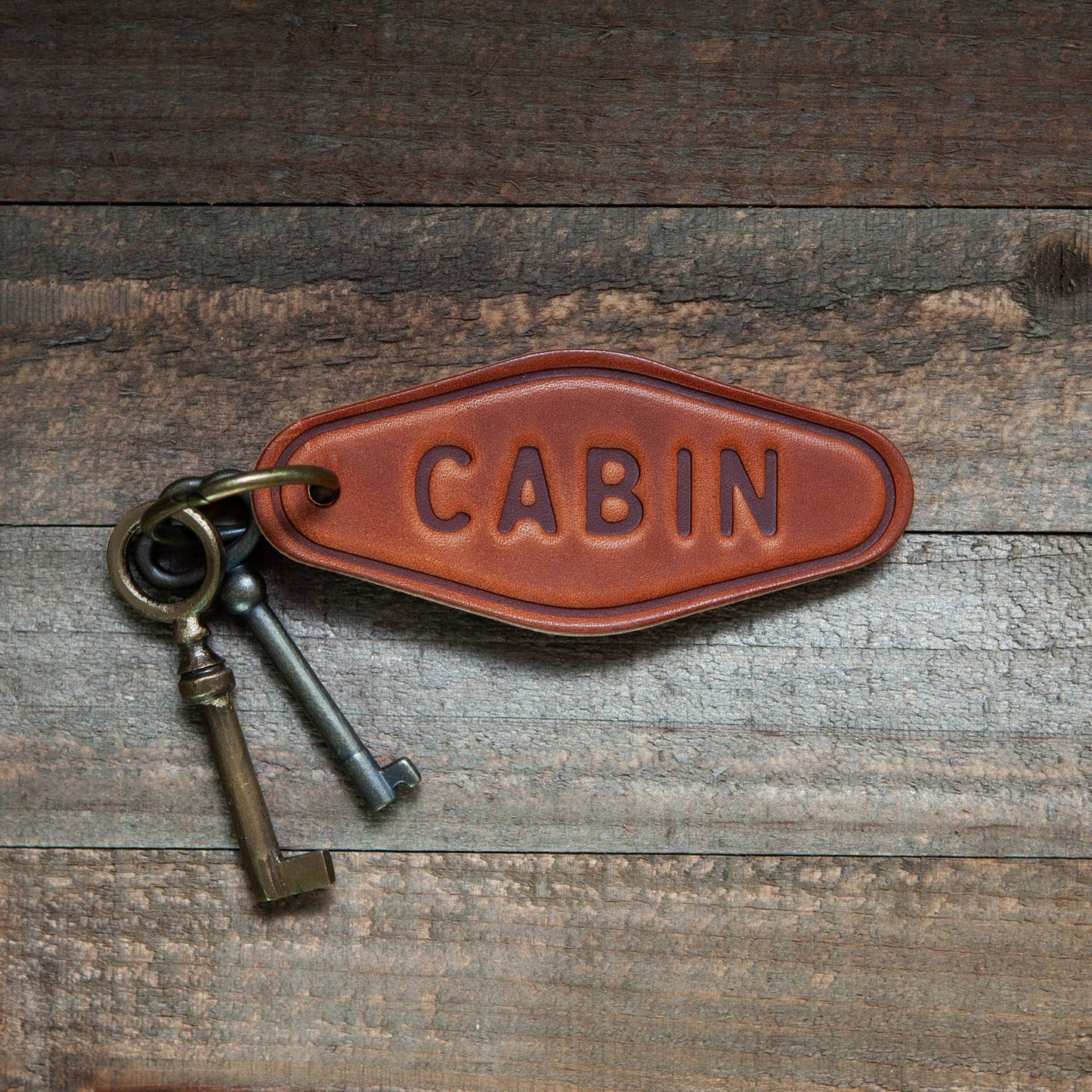 Cabin Leather Motel Keychain